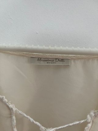 Blusa semitransparente cruda con borlas