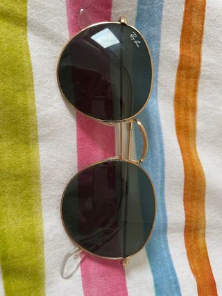 Gafas rayban round metal doradas