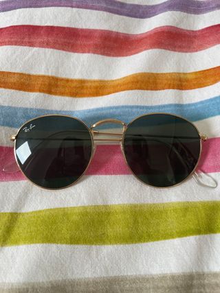 Gafas rayban round metal doradas