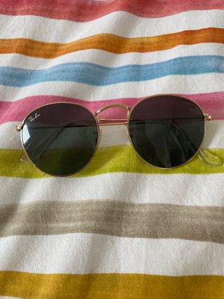 Gafas rayban round metal doradas