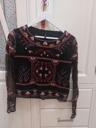 chaquetón y blusa