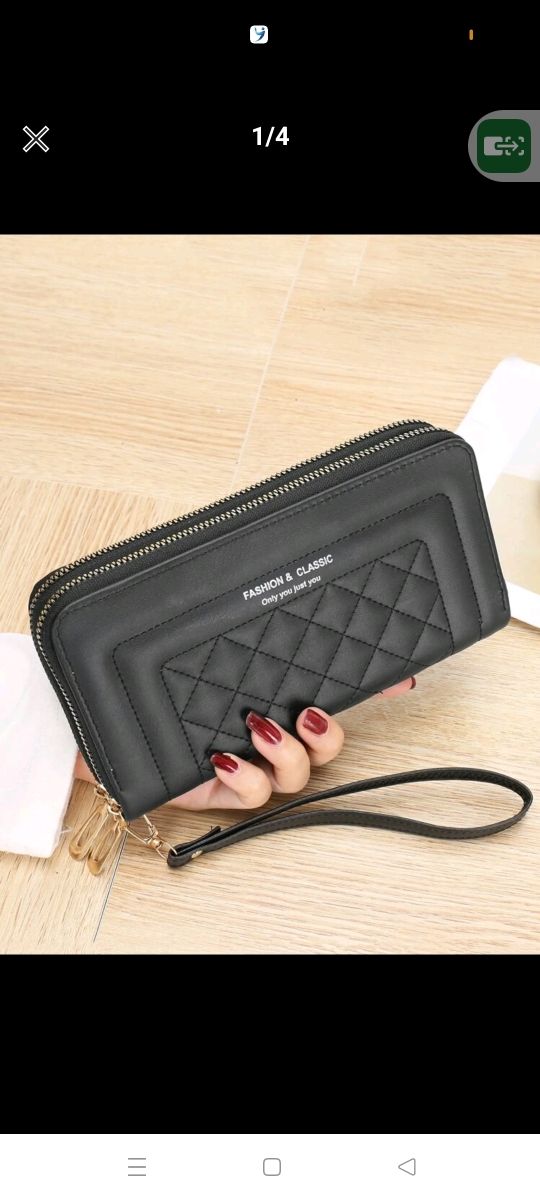 cartera negra grande con gran capacidad con etique