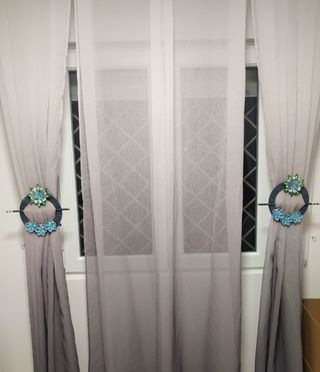 SUJETA CORTINAS
