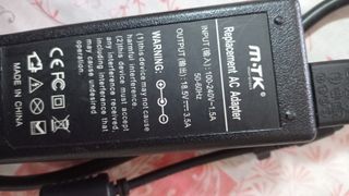 Cargador transformador de ordenador  portatil