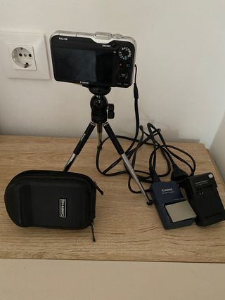 Cámara de fotos canon  y GPS dos baterías