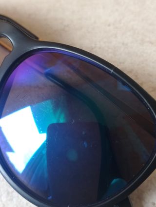 Occhiali da sole in metallo con lenti a specchio