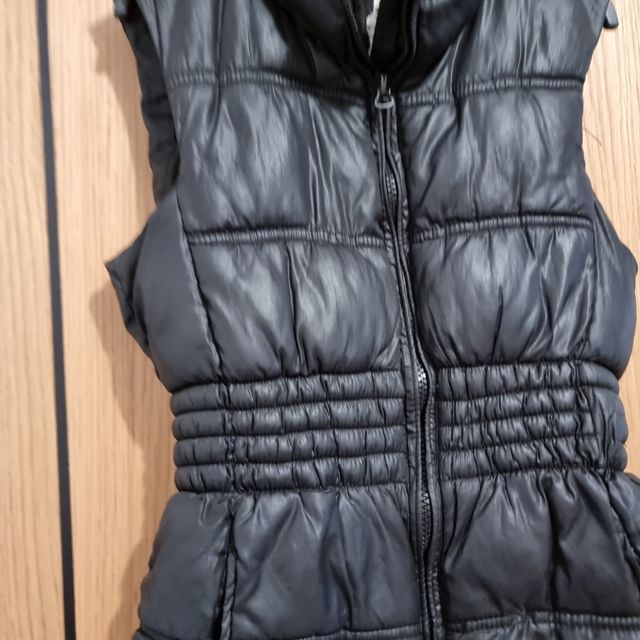 Chaleco negro niñs.