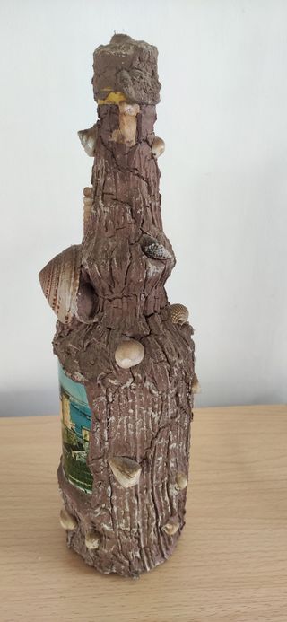 Bottiglia souvenir vintage con carillon