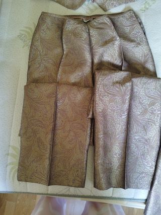 Gilet, pantaloni e cappotto firmati Synthesis