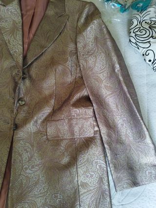 Gilet, pantaloni e cappotto firmati Synthesis