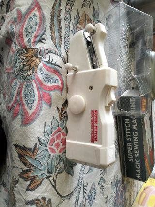 Maquina de coser  de viaje 