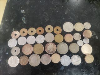 se venden monedas antiguas y modernas