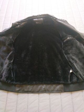 Chaqueta polipiel .
