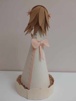 Muñeca fofucha de comunión. 