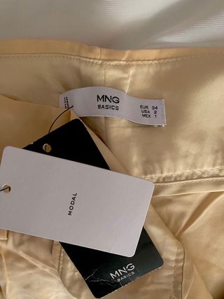 Pantalones de pinzas mango con cinturón