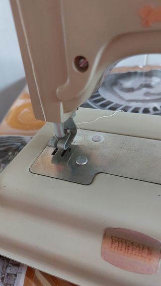 Máquina de coser infantil antigua Eureka