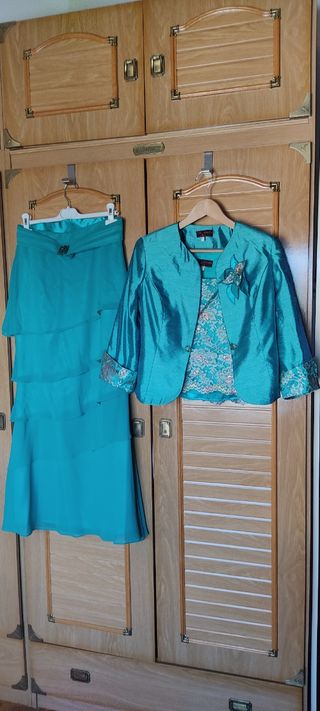  Traje 