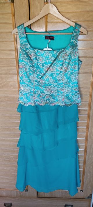  Traje 