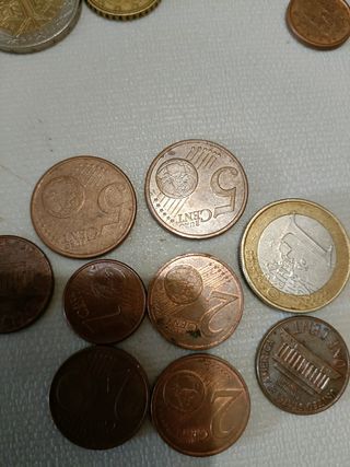monedas de 1,2y5 céntimos,2 one cent
