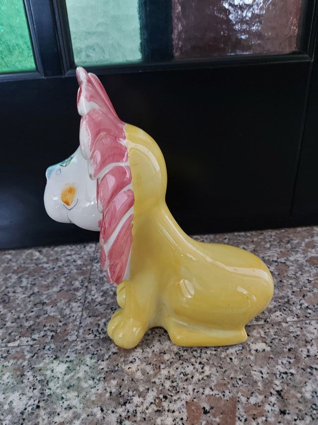 Salvadanaio a forma di leone