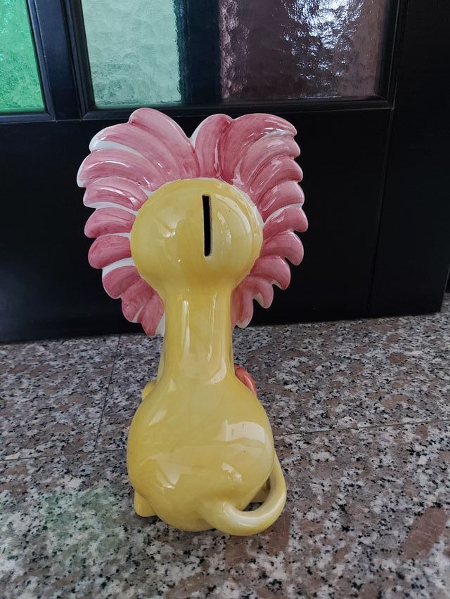 Salvadanaio a forma di leone