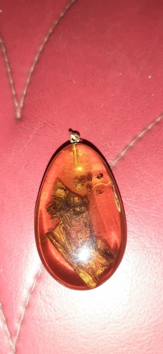 colgante de ámbar con oro