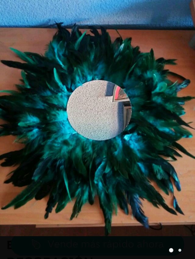 Jujuhat espejo plumas