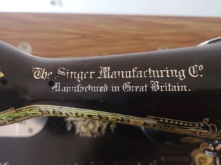 Máquina antigua de coser Singer