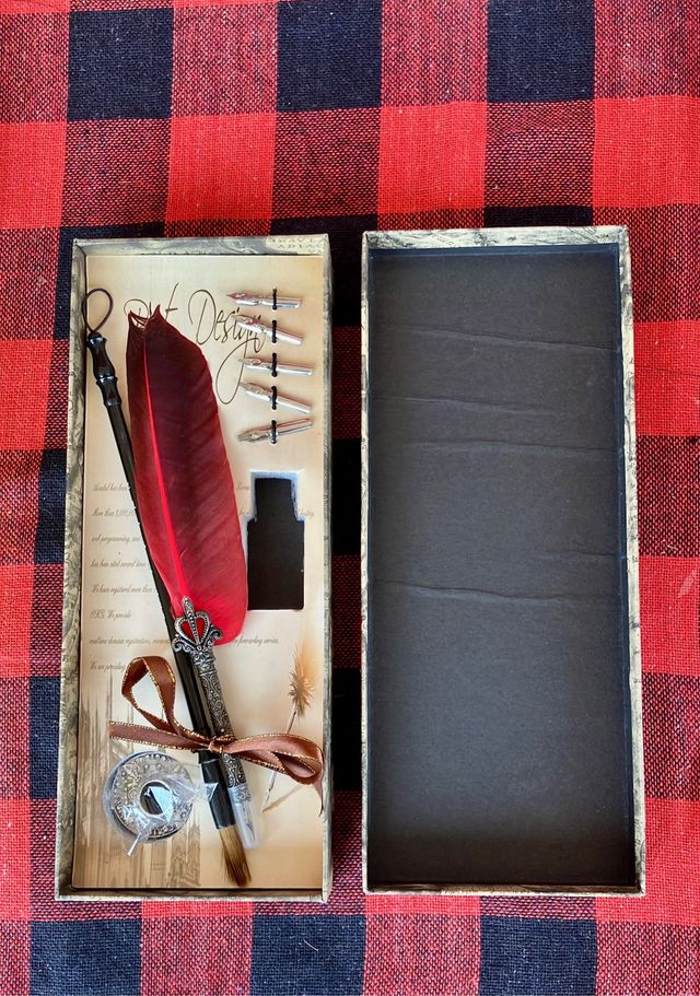 Pluma para escribir con tinta.