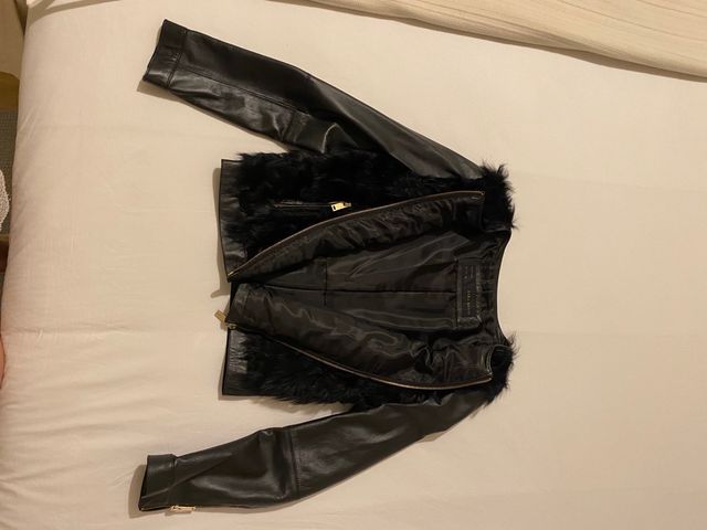 Cazadora de piel con pelo Zara