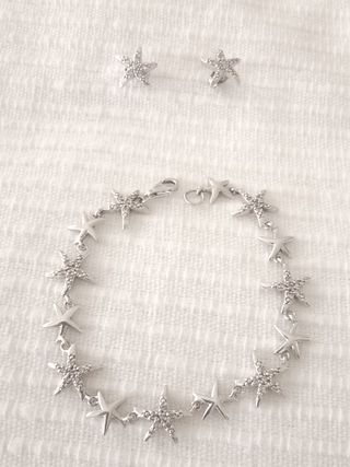 Conjunto de pulsera y pendientes de plata