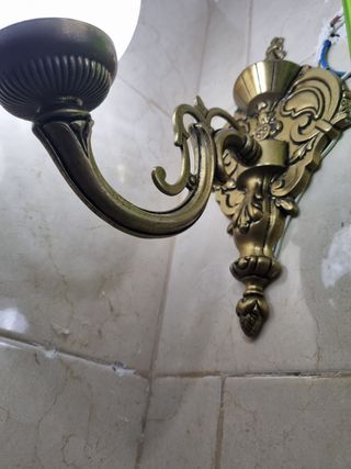 apliques de bronce, faro náutico y candelabros