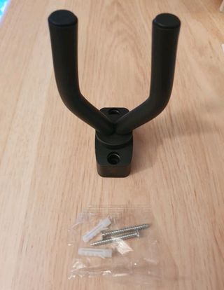 Soporte de pared, gancho para colgar la guitarra.