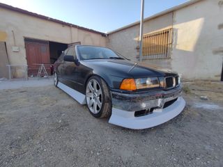 añadido jdm + taloneras bmw e36