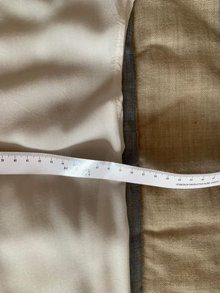 Camisa blanca sin mangas, de Mango, talla S.