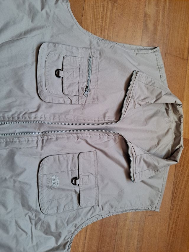 Chaleco. Reversible. Con bolsillos. Nuevo