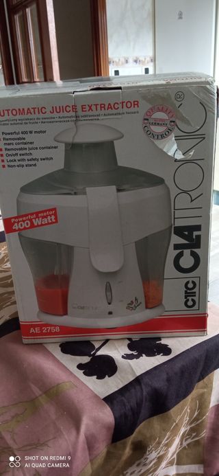 licuadora o esprimidor automático