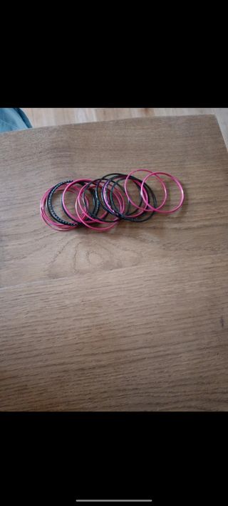 Bracciali in acciaio color fucsia e nero