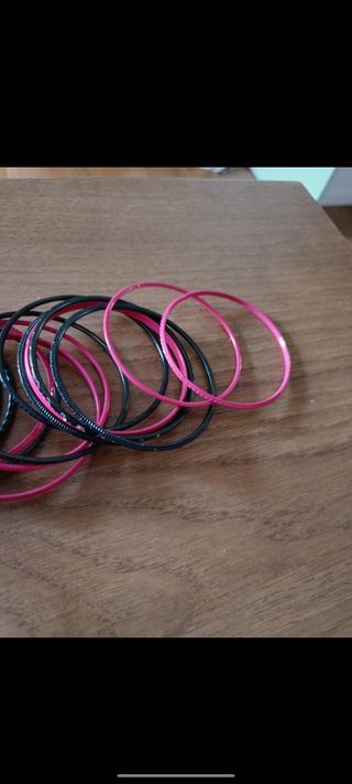 Bracciali in acciaio color fucsia e nero