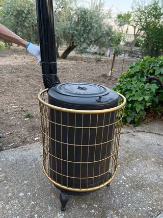 Estufa de leña con tubo