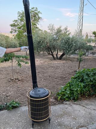 Estufa de leña con tubo