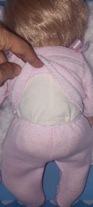 Muñeca. reborn. cuerpo de tela. ojos abiertos. niñ