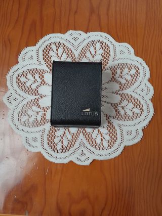 reloj lotus
