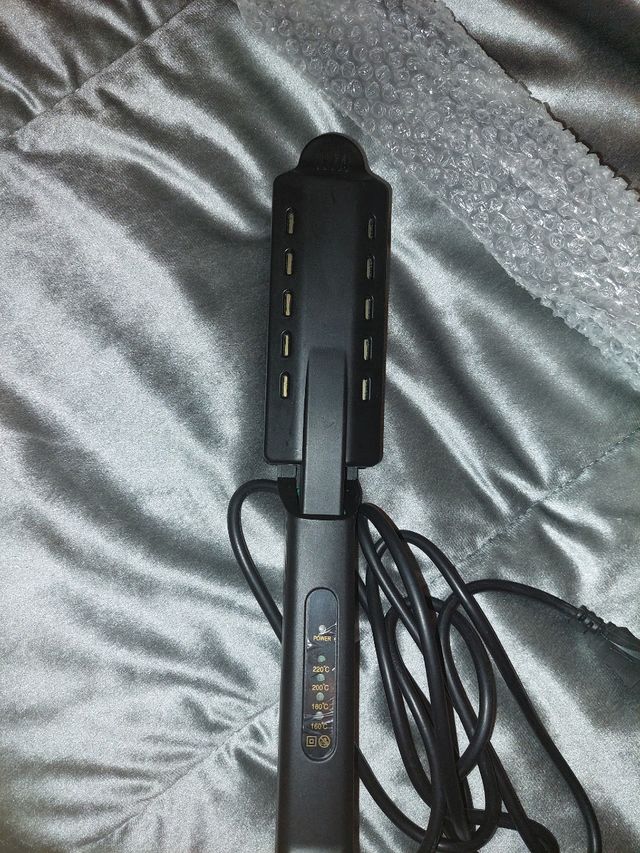 piastra per capelli nuova