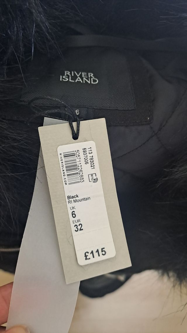 Parka sra color negro