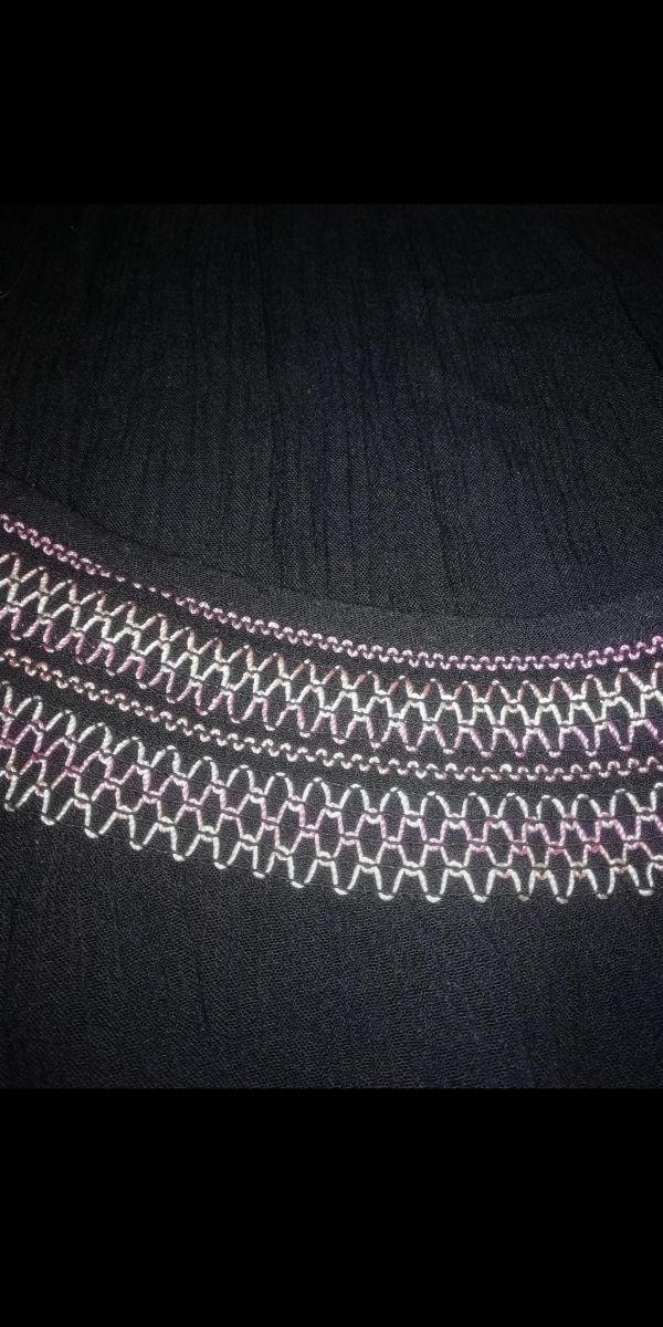 túnica con bordados 
