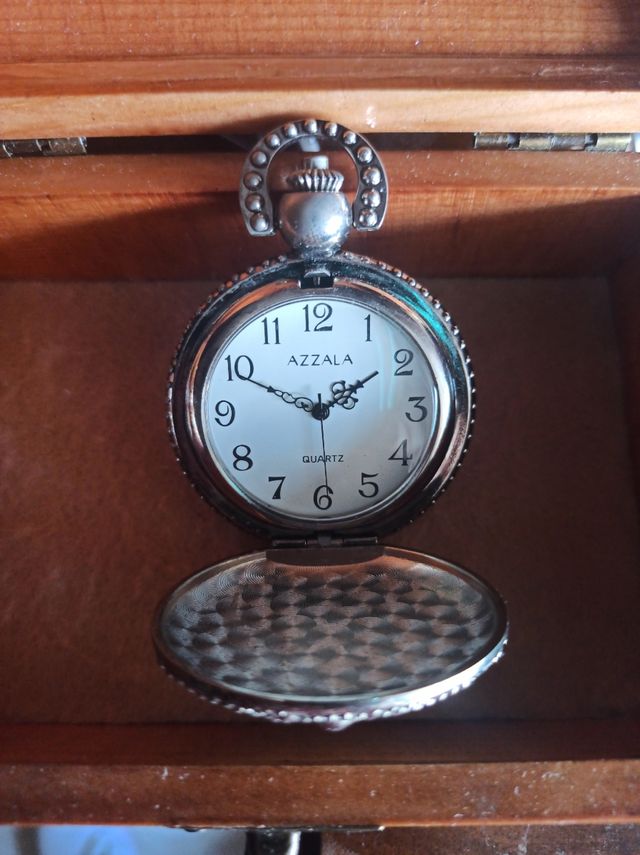 Reloj de bolsillo con tapa.