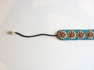 Cinturón abalorios y caracolas