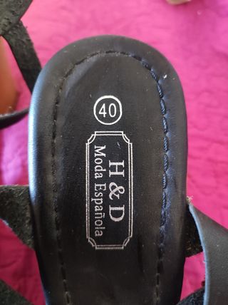 Short negro de media pierna