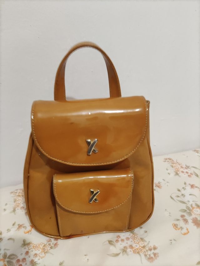 Mochila de mão da marca Paloma Picasso